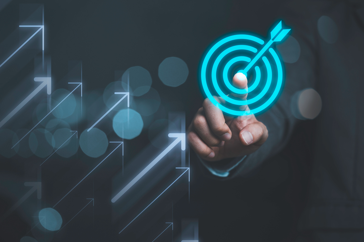 Glowing blue target with arrow, representing goal achievement and precision