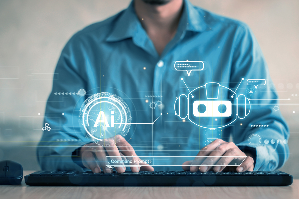 Person using computer with AI holographic interface and chatbot icon