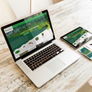 Responsive website design on laptop, tablet, and smartphone screens