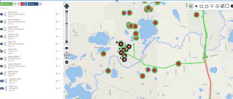 Topographic map with green and red markers near blue water bodies
