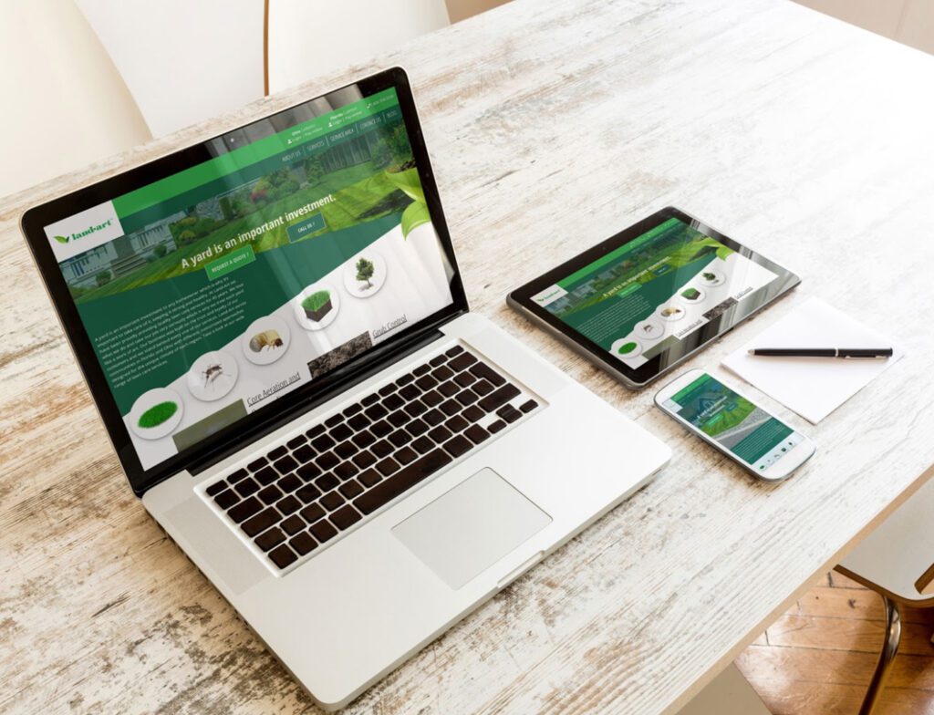 Landscaping website displayed across laptop, tablet, and smartphone screens