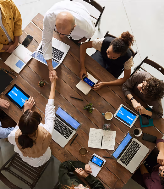 Cyber security team on laptops in office