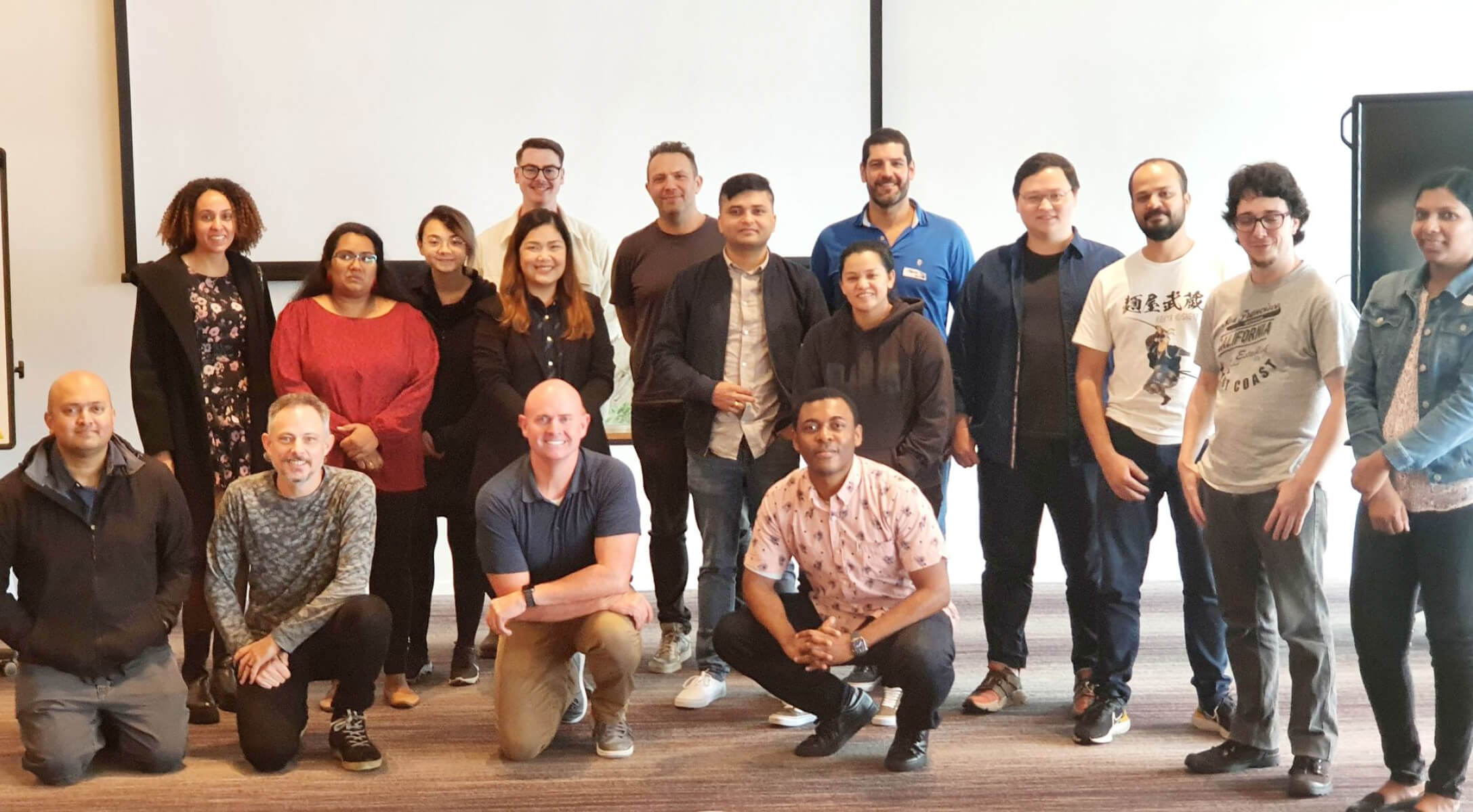 The Open tech team from Sydney, Melbourne and New Zealand together in person! Author, John Halls GM of Engineering, front, third from the left.