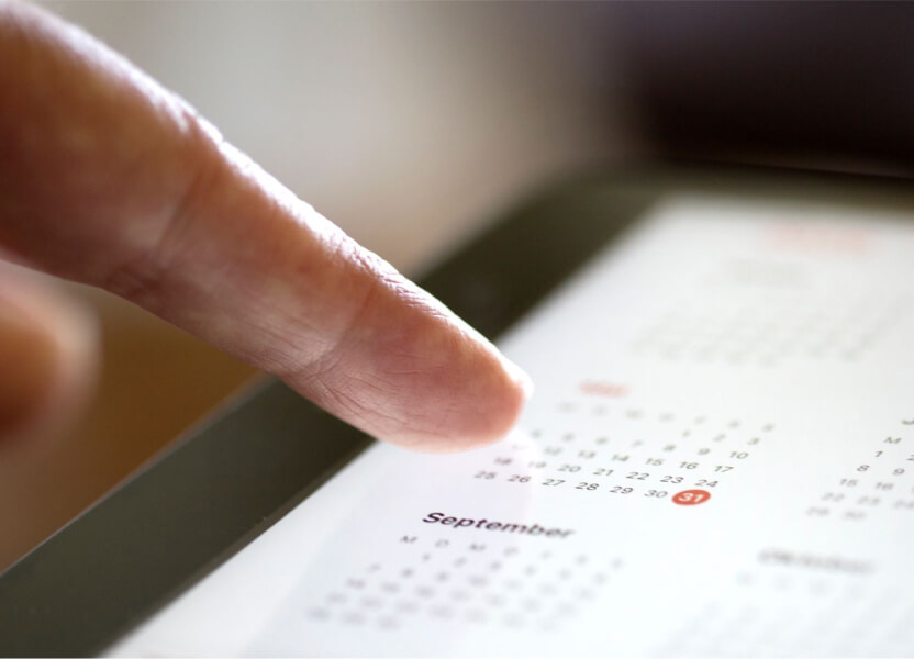 a person using their calendar on their phone