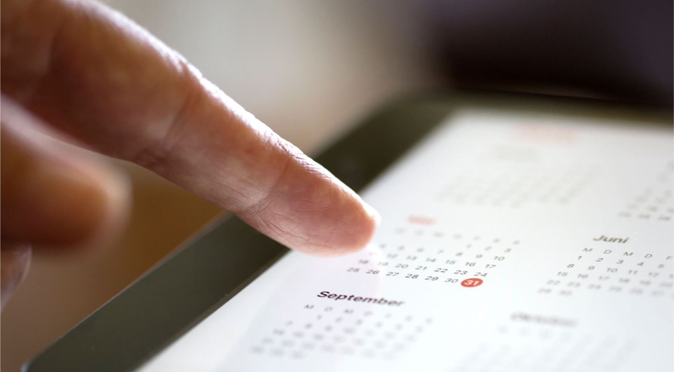 a person using their calendar on their phone