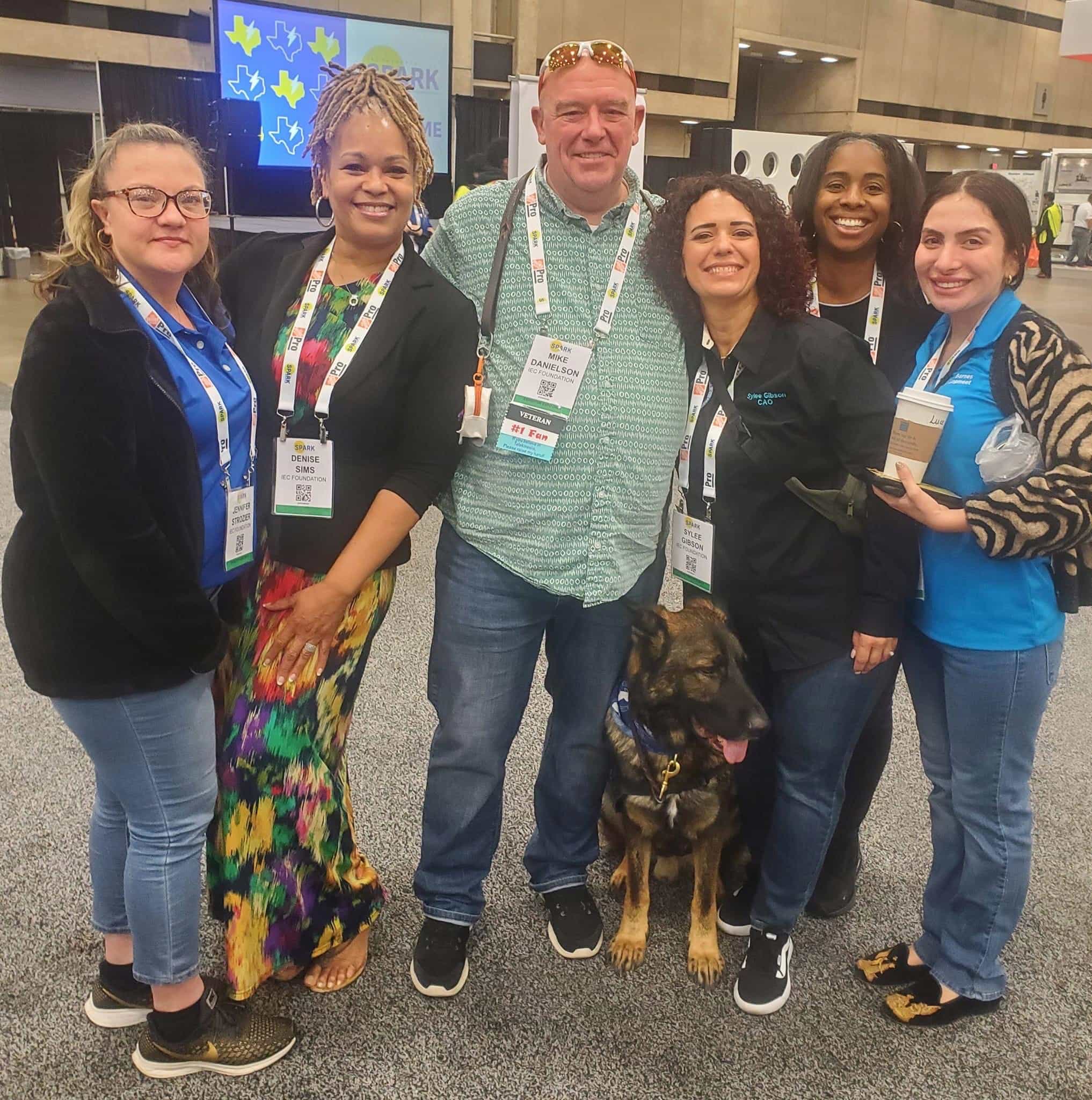 SPARK 2023 in Dallas: Jenn Dozier, IEC Foundation; Denise Sims, IEC Foundation; Mike Danielson and Santa Paws; Sylee Gibson, Guardian Angels; LaNa Al-Amin, IEC Foundation; Lucy Barnes, Guardian Angels.