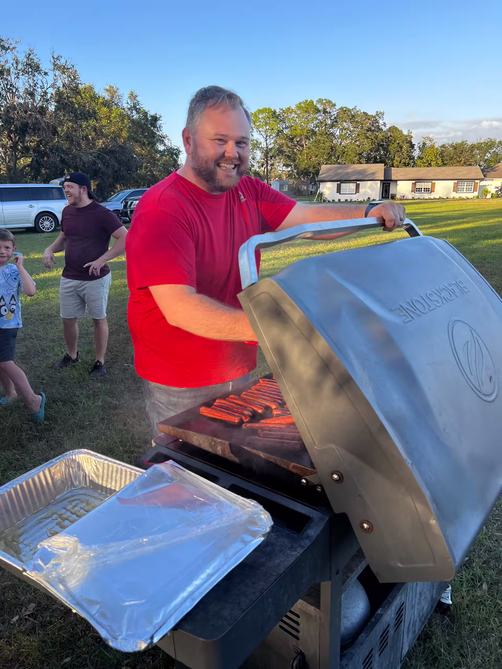 Man grilling at cookout picnic