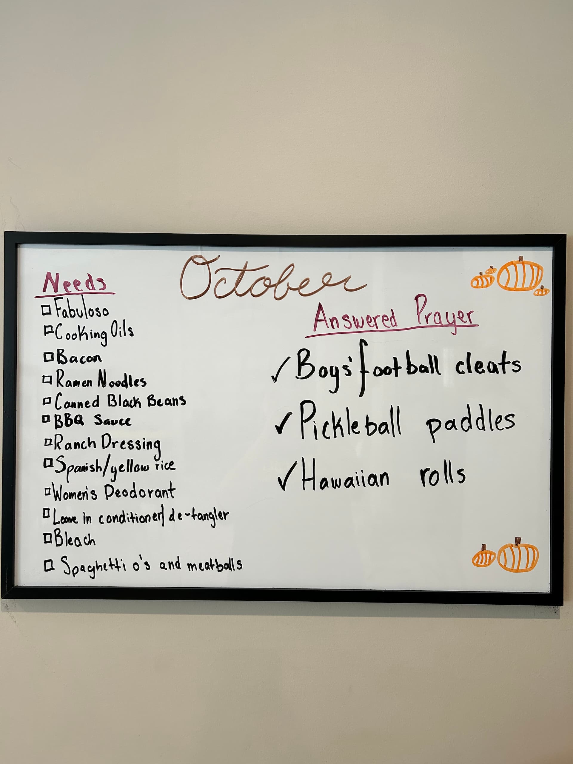 Whiteboard checklist of needs and answered prayers