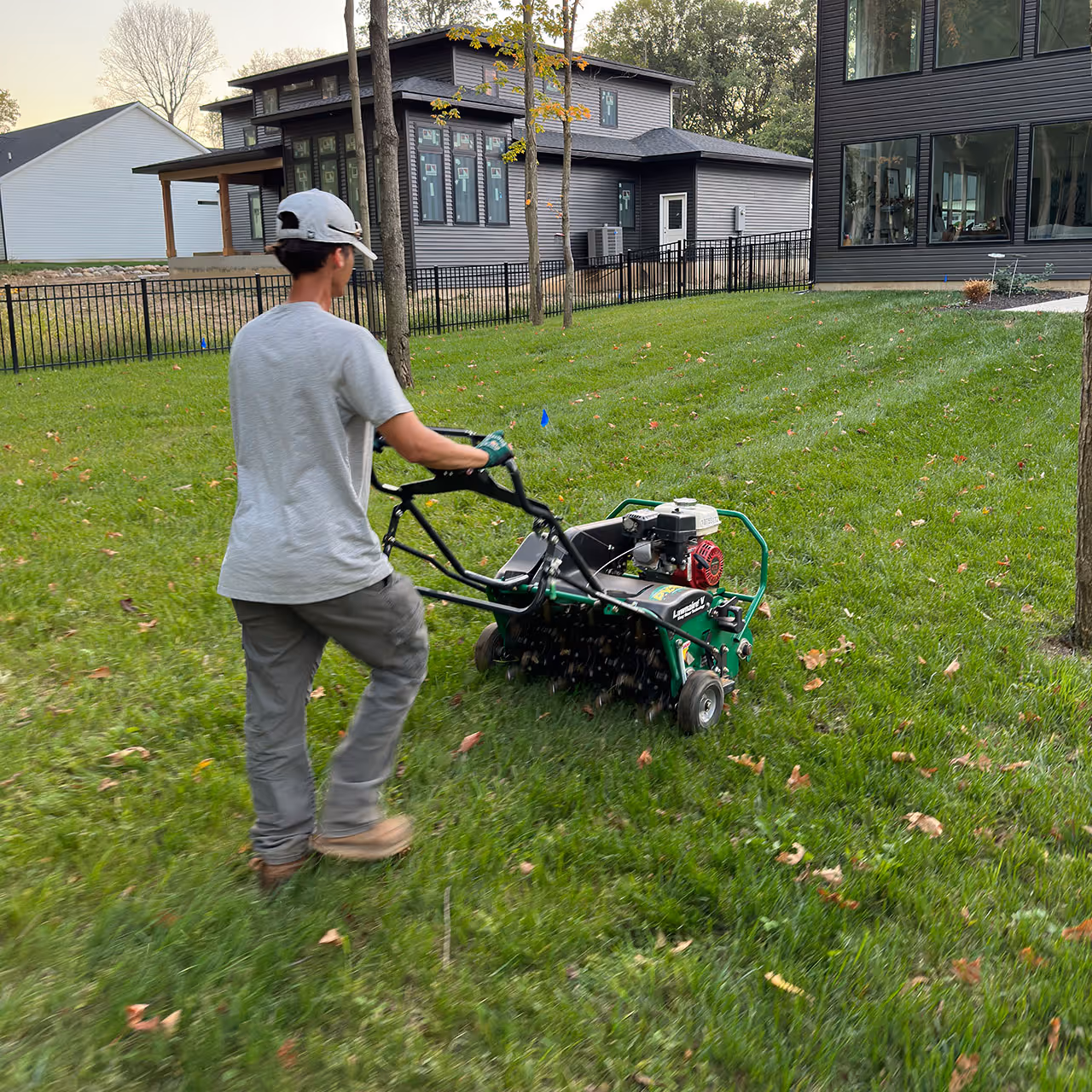 Antonio’s Outdoors delivering precise lawn mowing services using commercial equipment for a clean, even cut.