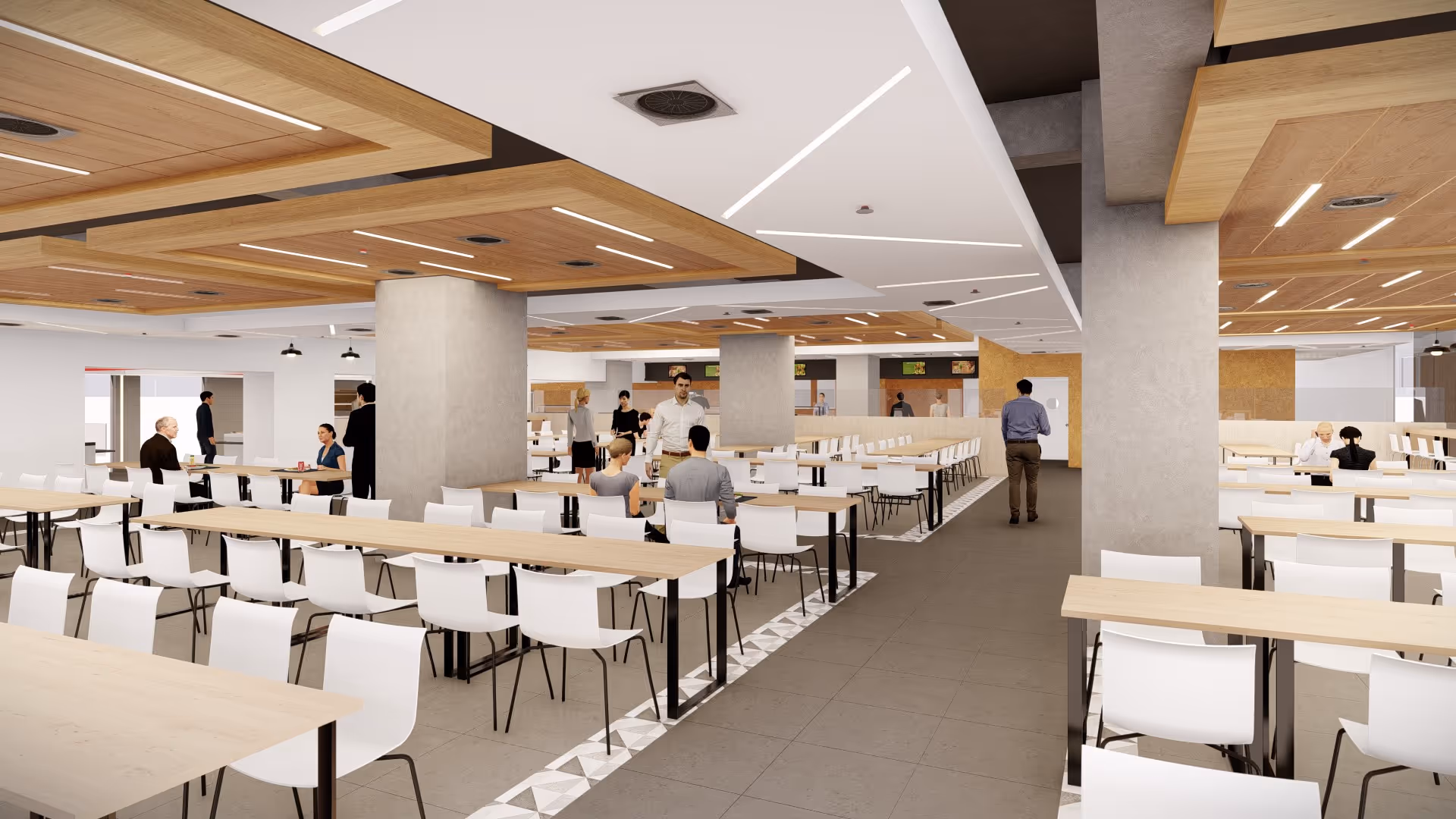 Comedor moderno con mesas largas de madera, sillas blancas, columnas grises y personas sentadas y caminando.