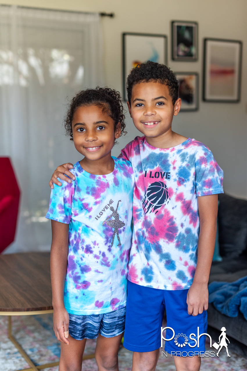 Custom tie dye shirts by popular LA fashion blog, Posh in Progress: image of a young boy and girl standing next to each other and wearing tie dye shirts. 