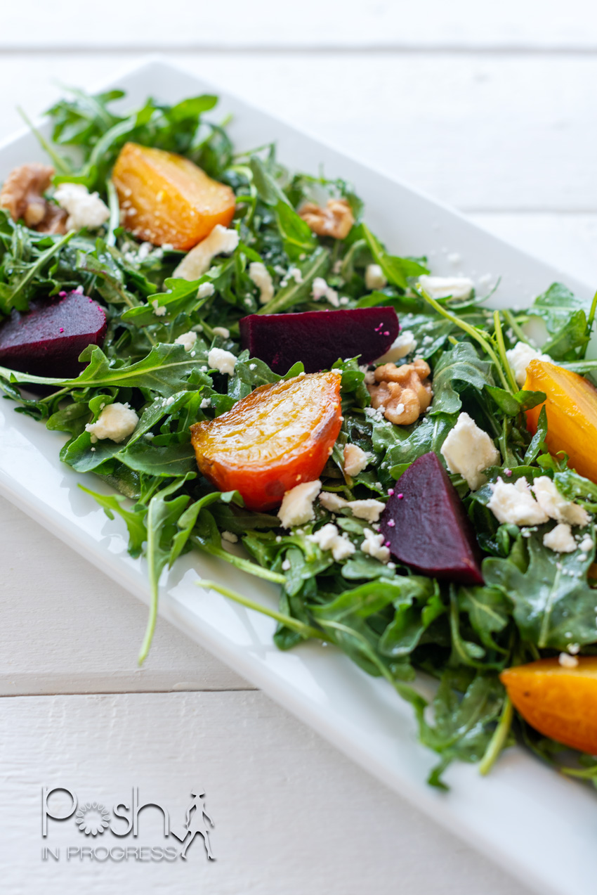 arugula beet salad 2 | Arugula Beet Salad by popular LA lifestyle blog, Posh in Progress: image of an arugula beet salad on a rectangular white plate.