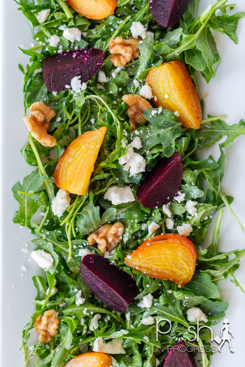 arugula beet salad | Arugula Beet Salad by popular LA lifestyle blog, Posh in Progress: image of an arugula beet salad on a rectangular white plate.