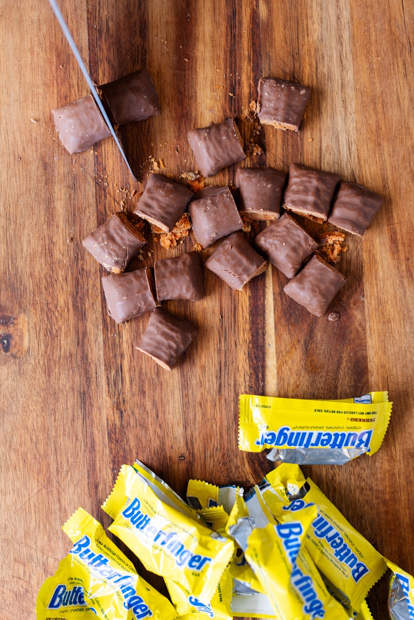 Butterfinger Blondies Recipe featured by top LA lifestyle blogger, Posh in Progress