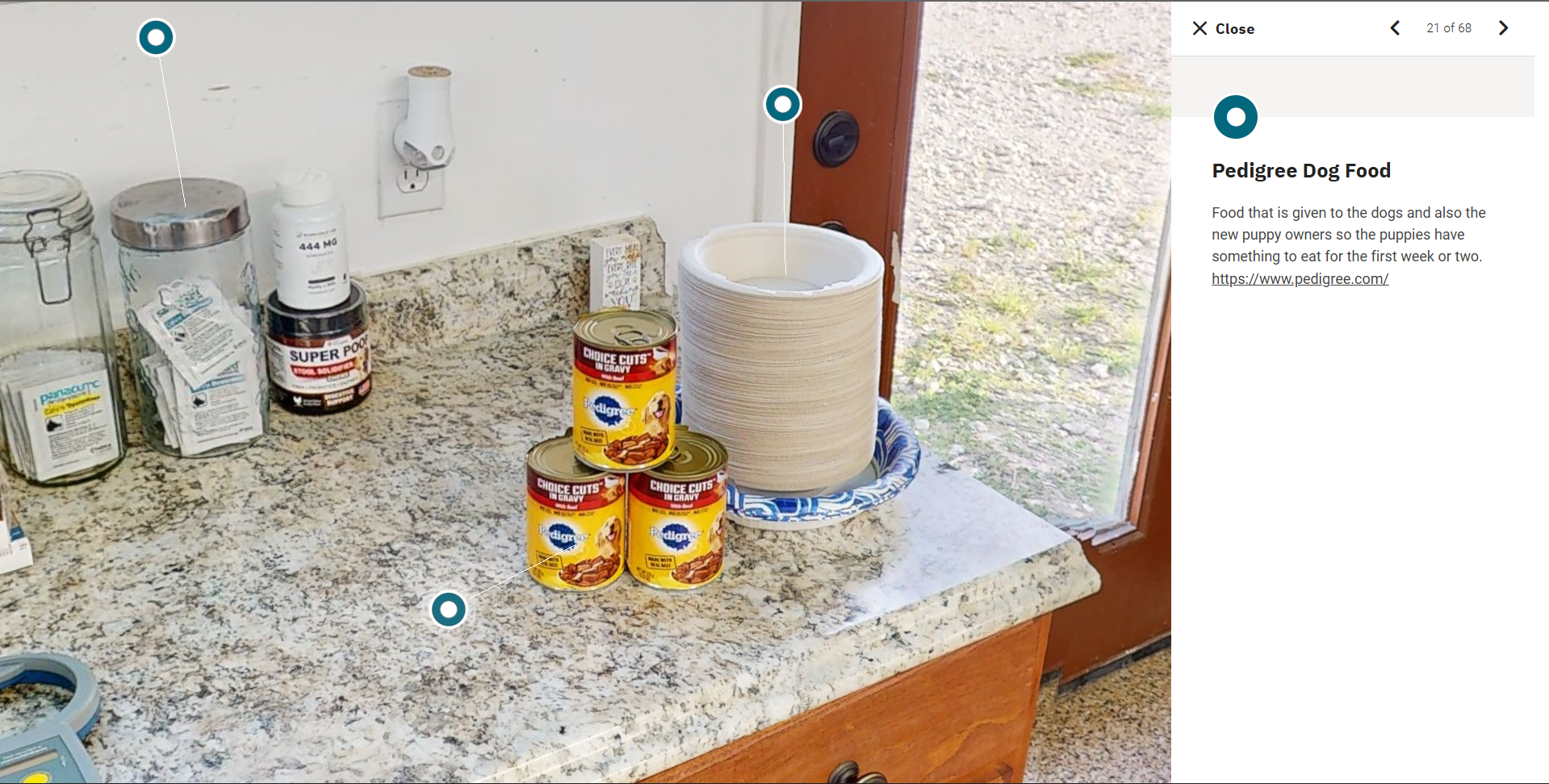 Screenshot of a Matterport 3D scan of a puppy breeding facility. The picture focuses on a can of dog food.
