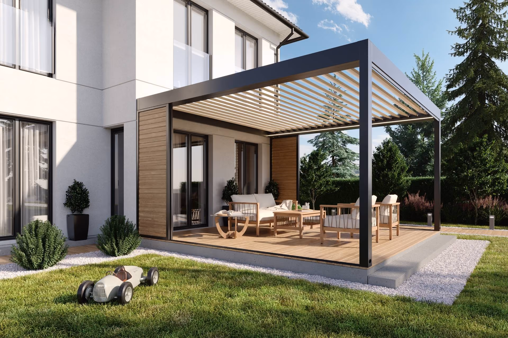 Moderner Gartenpavillon mit Holzterrasse, Lounge-Möbeln und sichtbarem weißen Haus im Hintergrund.