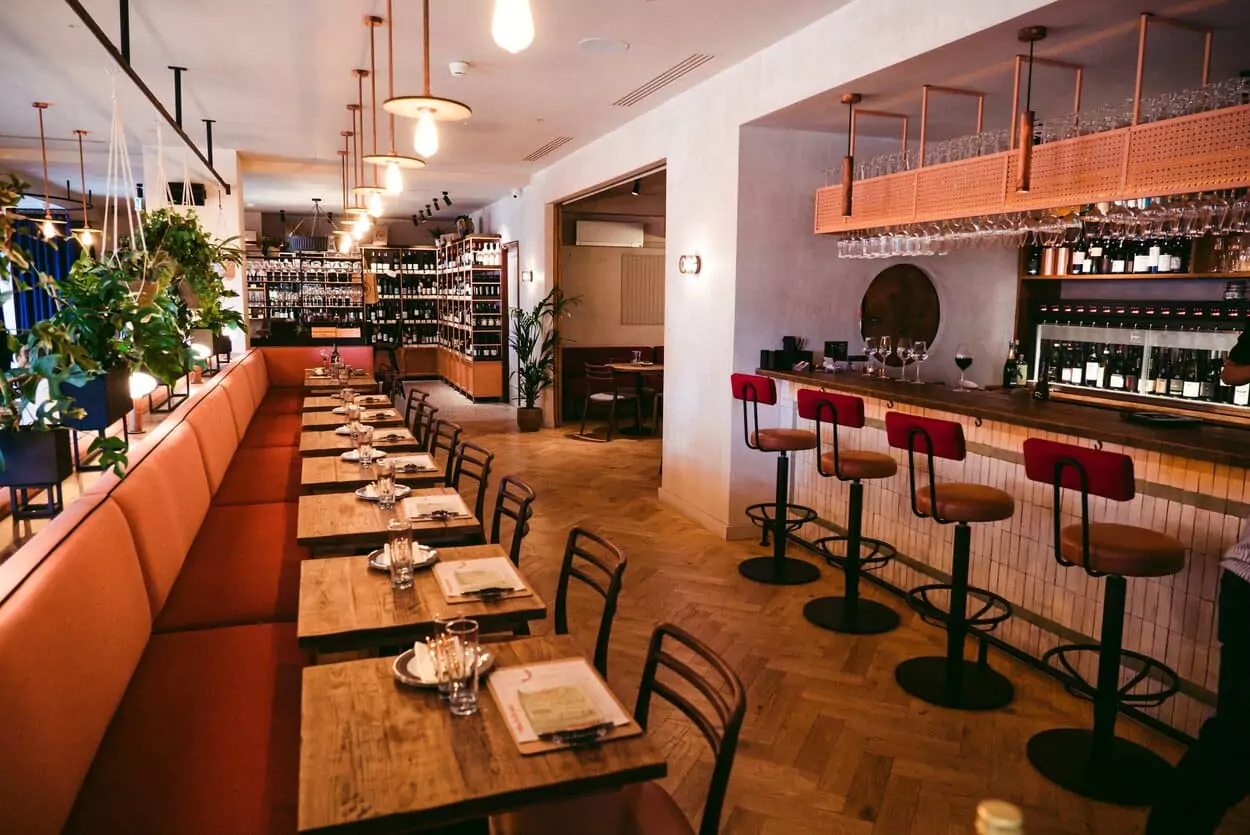 Right on the waterfront, Humble Grape brings over 450 artisan wines to Canary Wharf. Find more waterside dining spots like this on Ambl. 