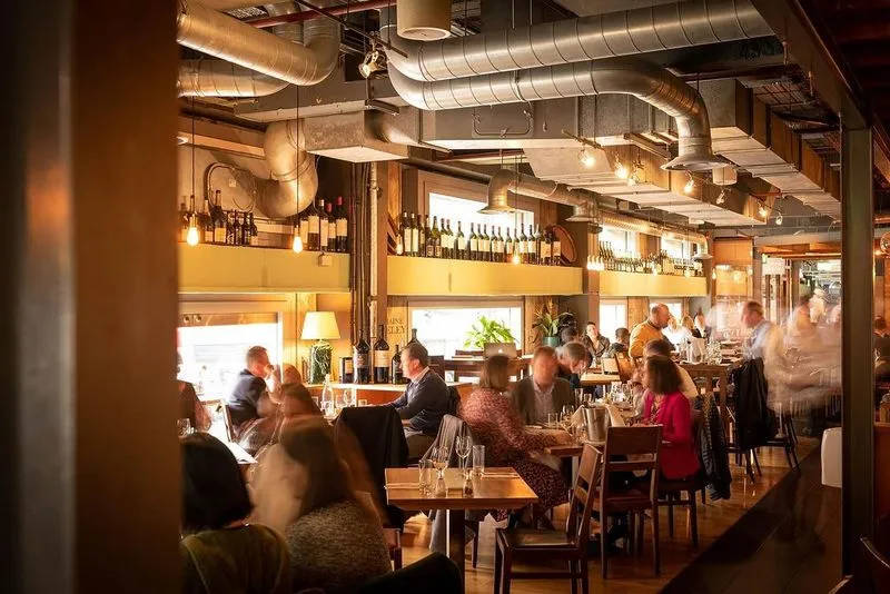 Just steps from the Thames, Vivat Bacchus at London Bridge offers South African dishes, top-notch steaks, and an impressive wine selection. No fuss, just great food. Reserve your table on Ambl.