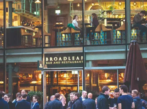 The exterior of Broadleaf Bar and Restaurant, a stylish venue featured on Ambl where users can book drinks and dining experiences instantly.