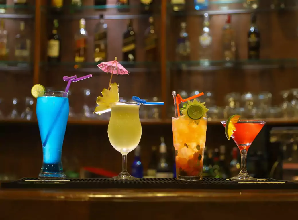 A display of vibrant and exotic cocktails at an Ambl-listed venue, offering users a taste of the best mixology experiences in their city.