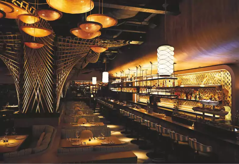 A contemporary fine-dining space with an intimate setting, soft lighting, and elegant decor. Let Ambl help you find the perfect dinner spot.