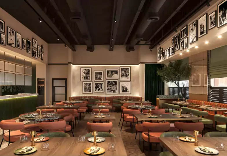 A cinematic-inspired dining room with moody lighting, sleek decor, and black-and-white photography lining the walls. A sophisticated setting that blends classic charm with modern elegance. Discover more elegant restaurants on Ambl.