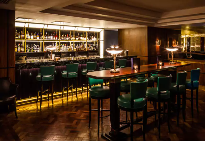 A classic steakhouse with plush leather booths, warm lighting, and a vintage feel, offering an elevated dining experience. Discover more classic restaurants on Ambl.