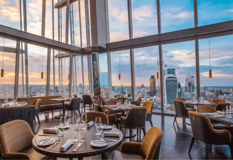 A grand and atmospheric pub with ornate chandeliers, a stunning bar lined with craft beers, and a lively crowd—perfect for a memorable birthday celebration. Find the best birthday venues effortlessly with Ambl.