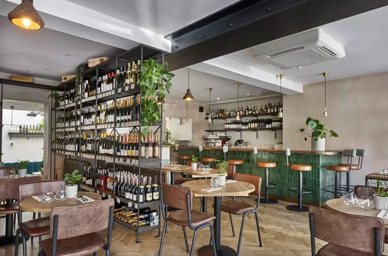 Tucked between the elegant brickwork and greenery of Islington, Humble Grape offers over 400 sustainable wines in a cozy, modern setting. Find more cosy wine spots like this on Ambl.