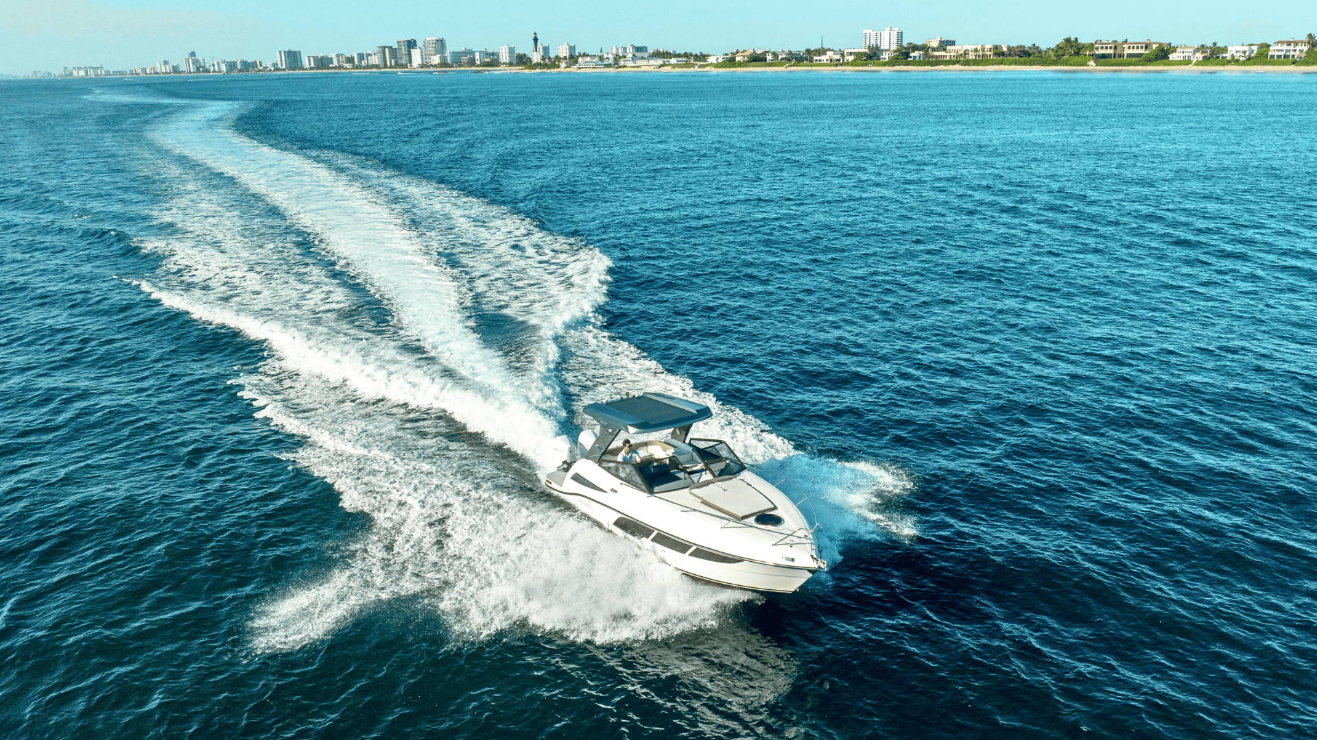 Modern Valiatt luxury yacht cruising at speed in open waters