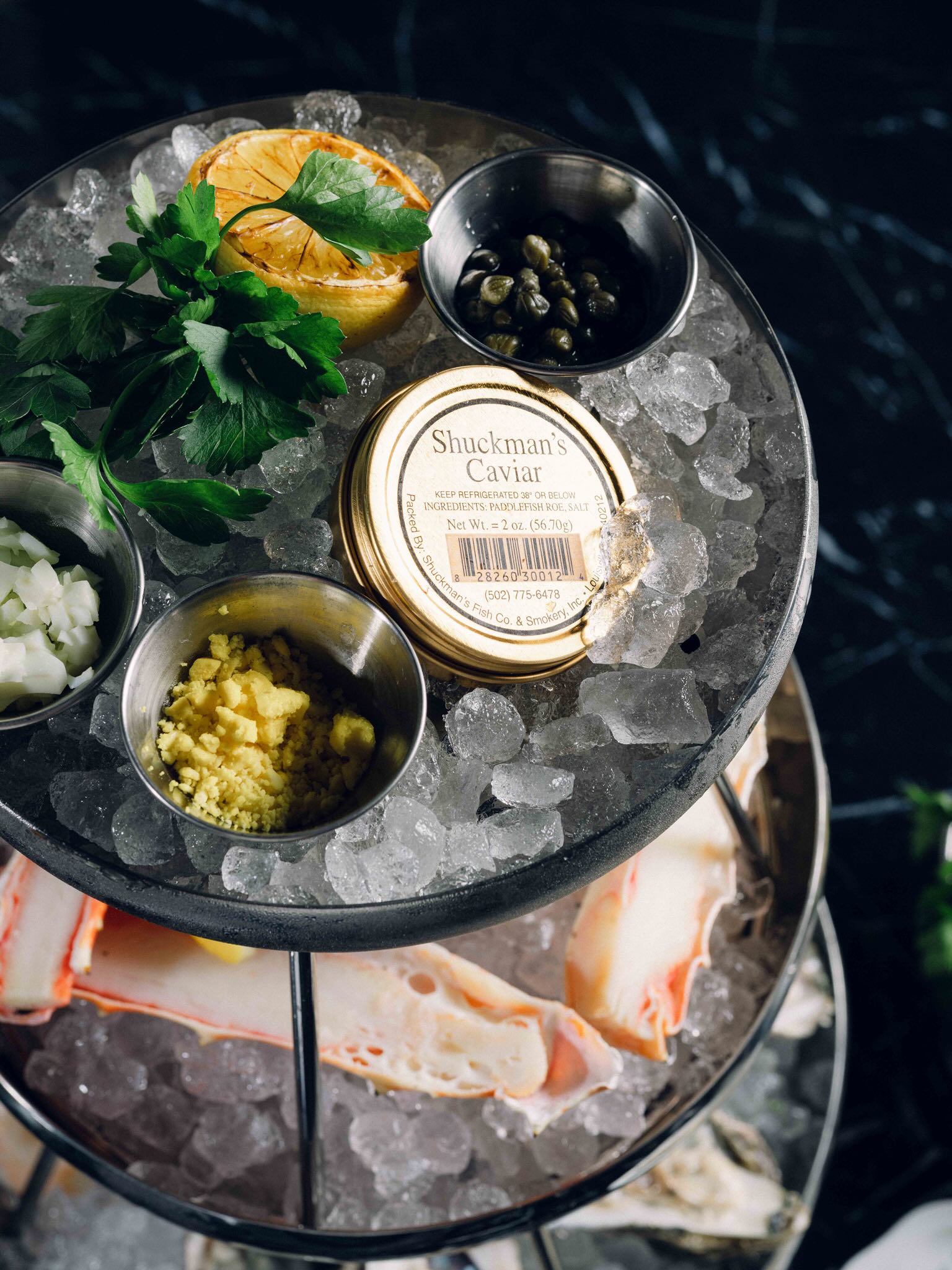 A plate of food on a table with ice.