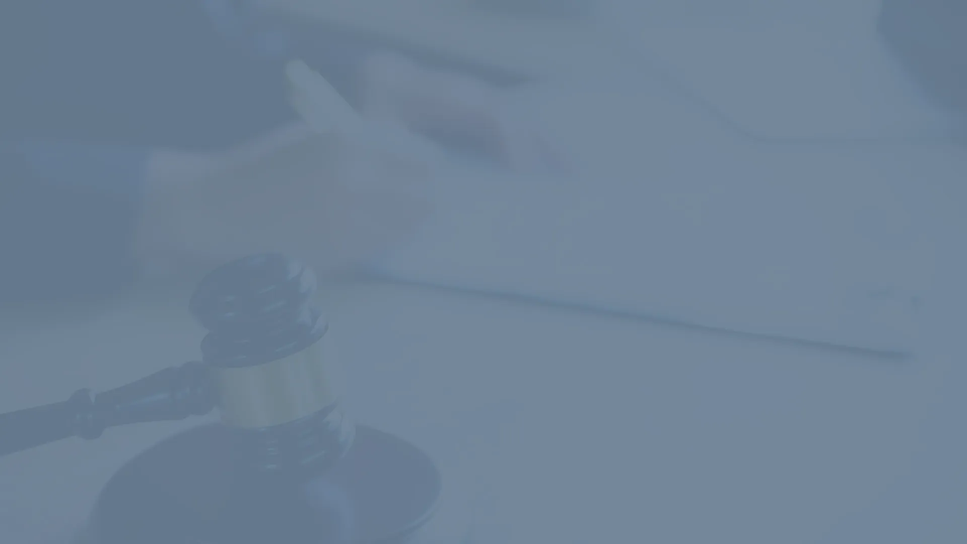 Faded background image of a gavel