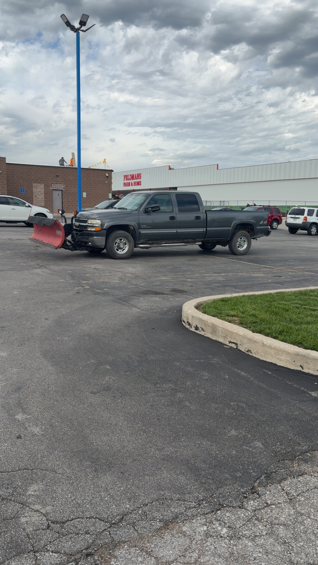 Marrs Lawn and Landscape plow truck ready for snow removal service in Grain Valley, MO.