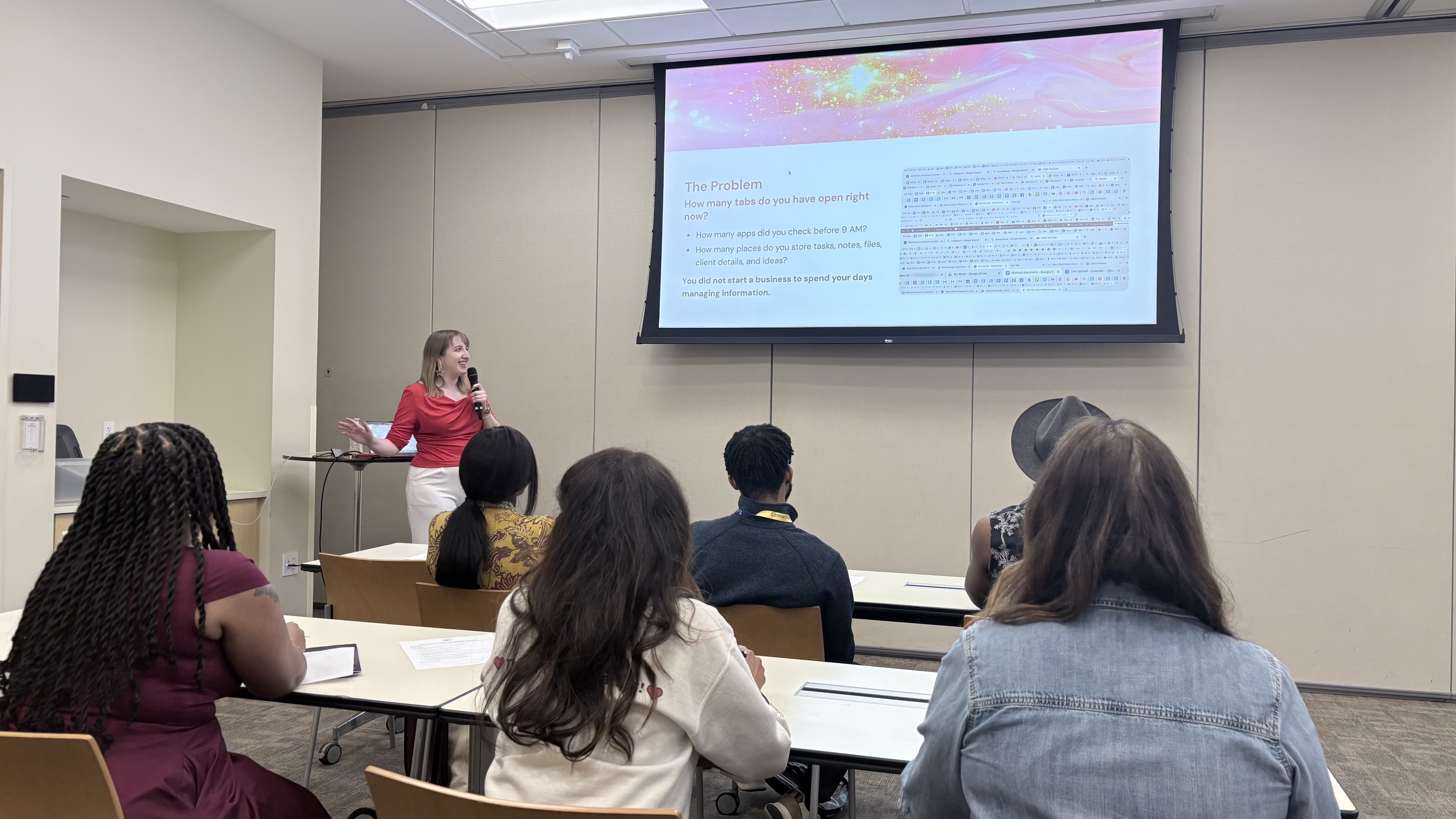 Jenna Redfield presenting to a workshop audience
