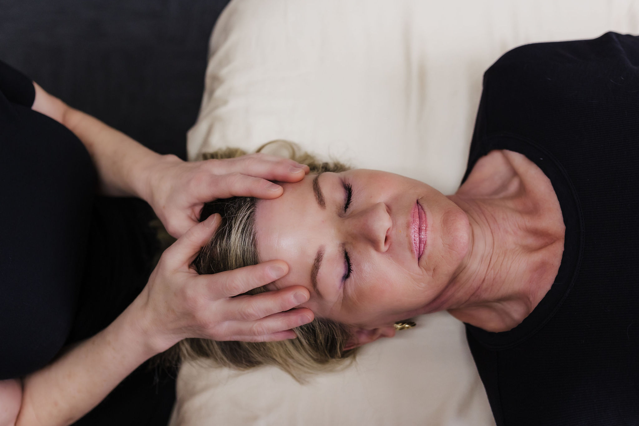 Deb giving a woman a massage
