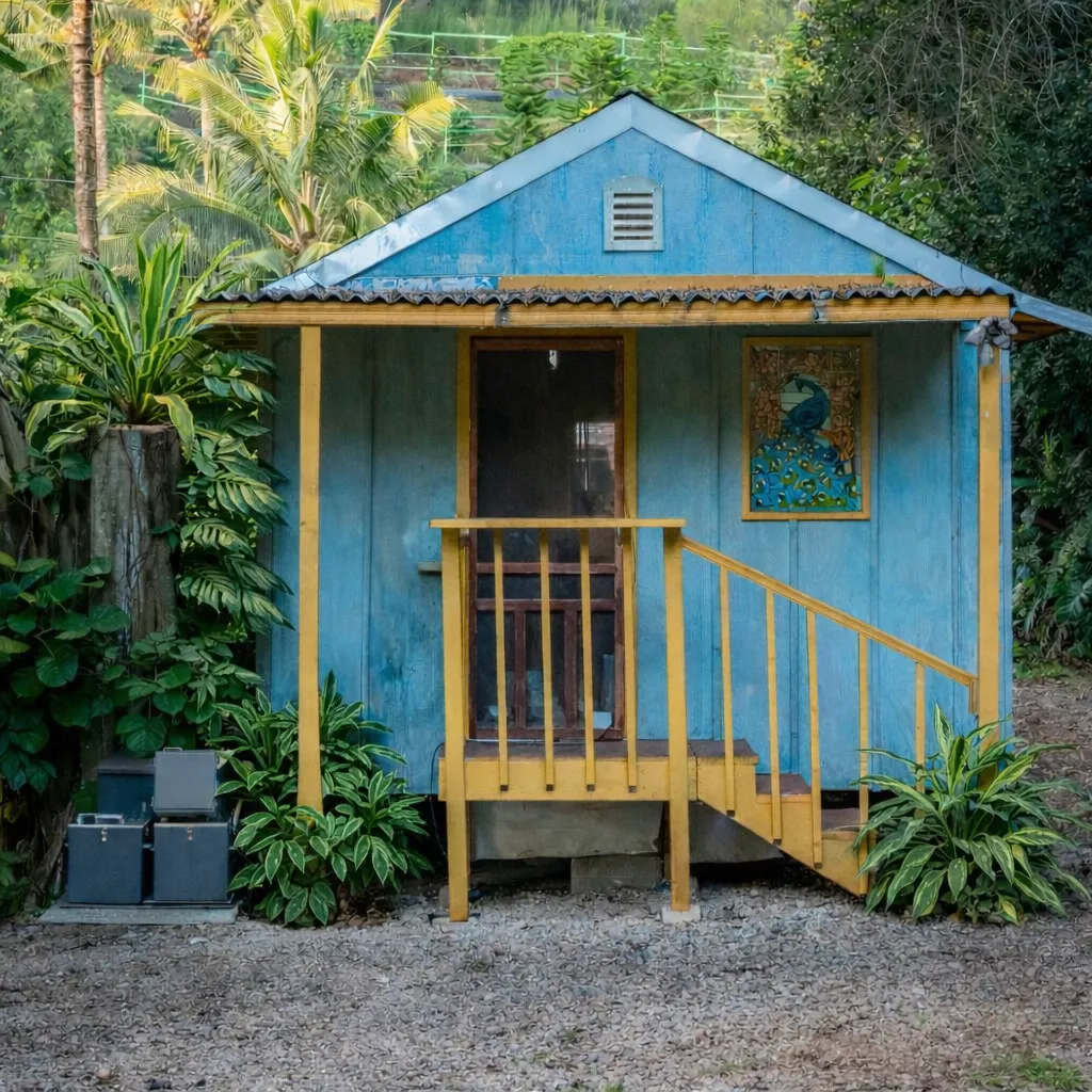 Mata installed next to a small studio home in a lush tropical valley. 