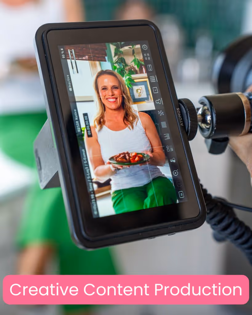 High-quality video production setup with cameras, lighting, and crew capturing footage, illustrating the process of creating professional videos for marketing, events, or storytelling.