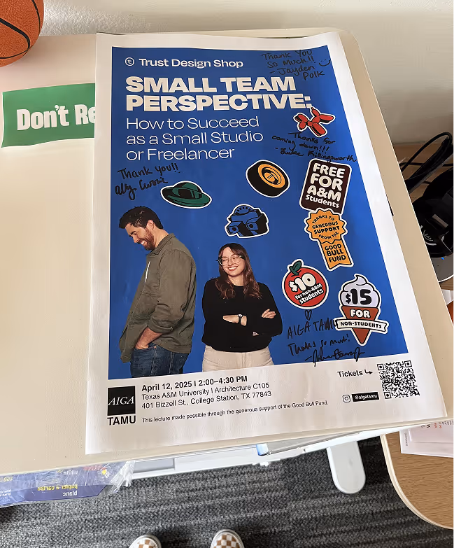 Poster for Trust Design Shop event titled 'Small Team Perspective: How to Succeed as a Small Studio or Freelancer' featuring a man and woman standing side by side, stickers, and handwritten thank you notes.