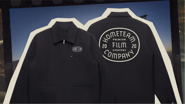 Black jacket with front text 'HOMETEAM' and back text 'HOMETEAM PREMIUM FILM CONTENT COMPANY 2020' in white.