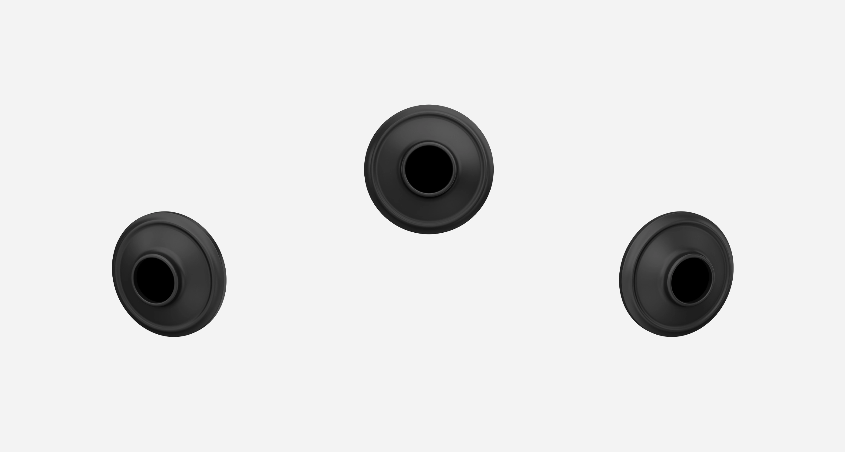 Three matte black trim pieces with no lever and displayed at three angles on a white background.