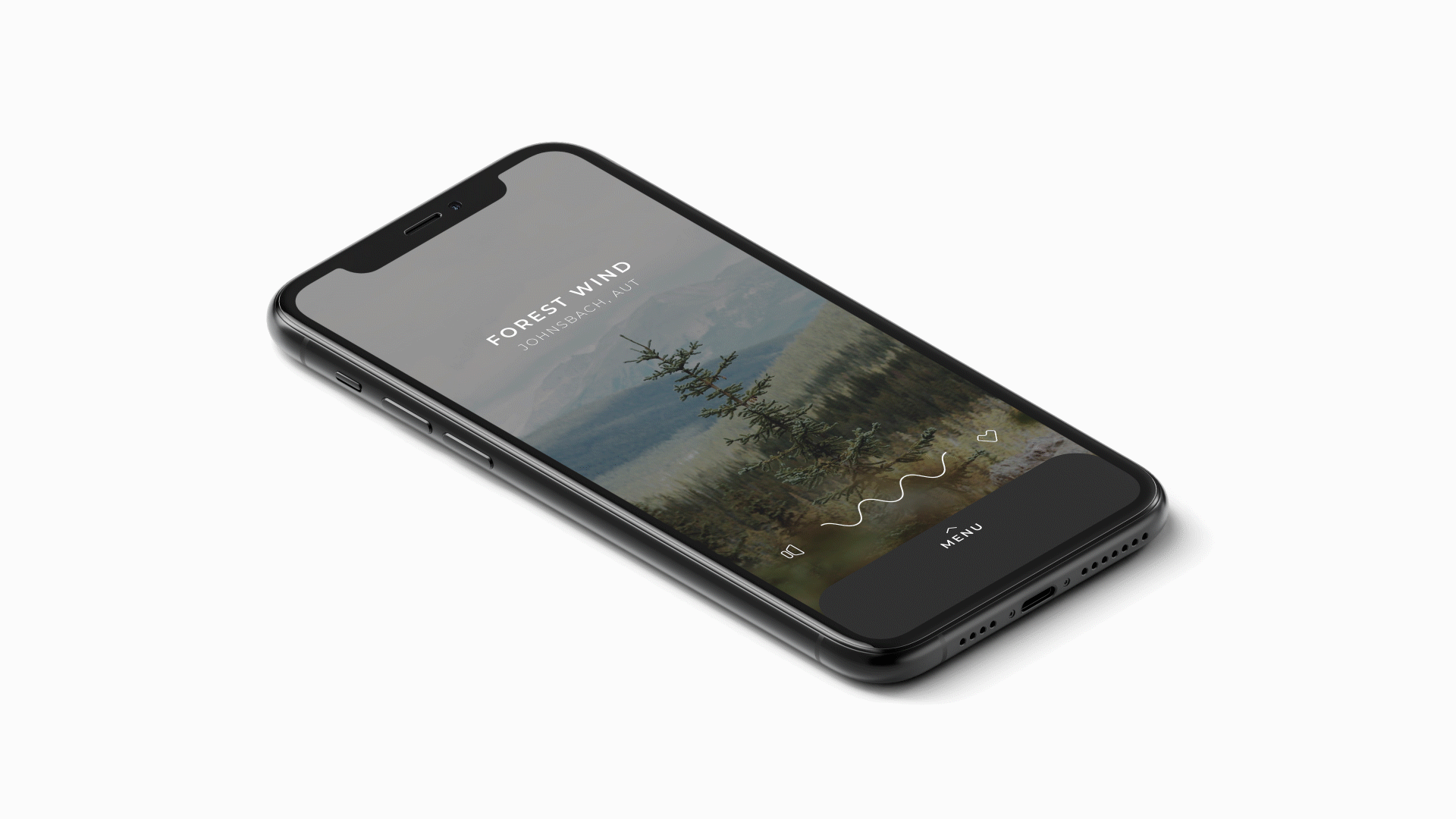 Black smartphone displaying a nature-themed app screen with the text 'Forest Wind Johnsbach, AUT', an animated wave indicator, and icons for sound and favorites, tilted on a white surface.