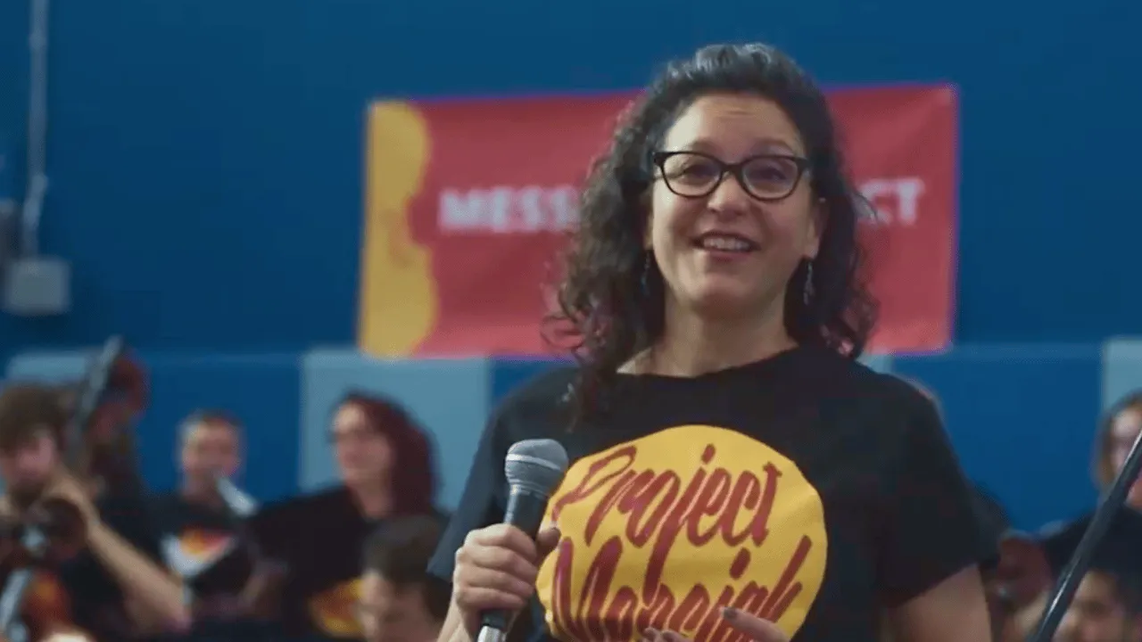 Woman speaking during an interview on camera