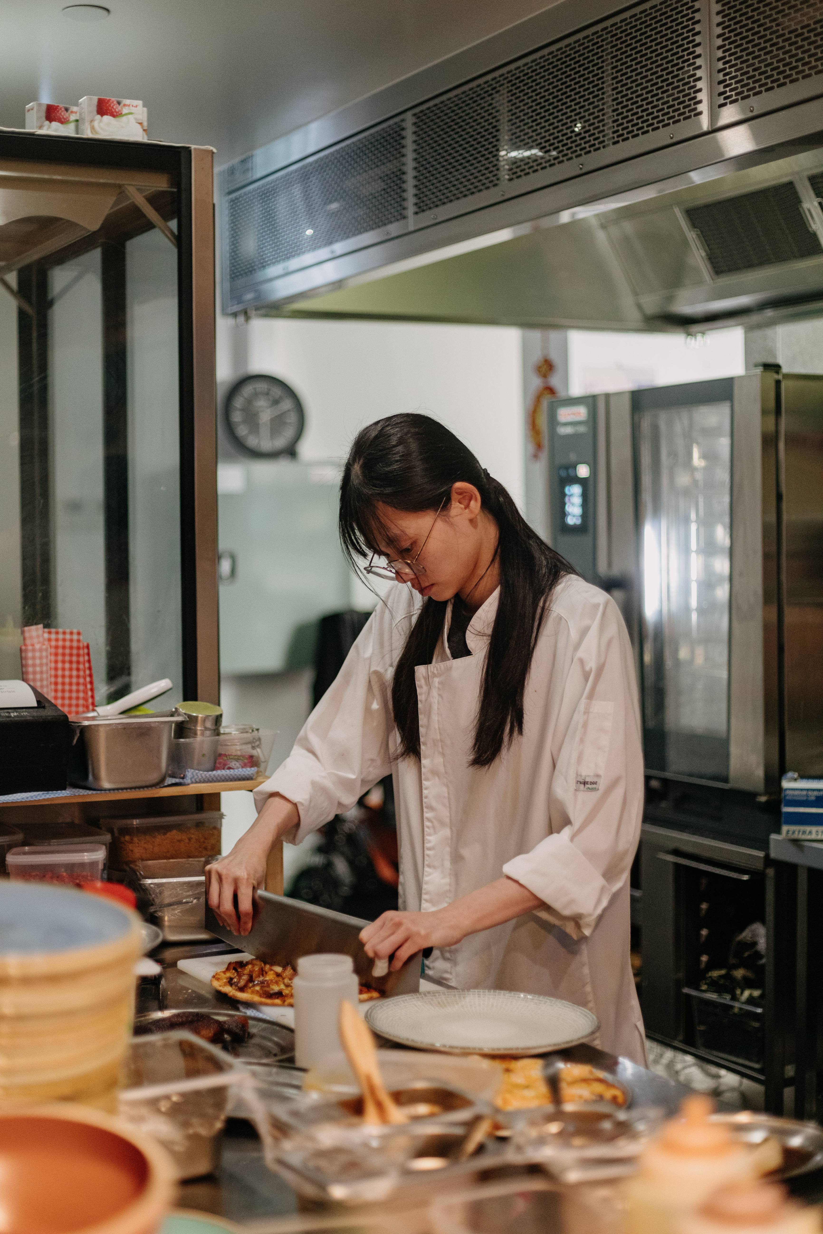[background image] image of office workspace with desks (for a film production company)