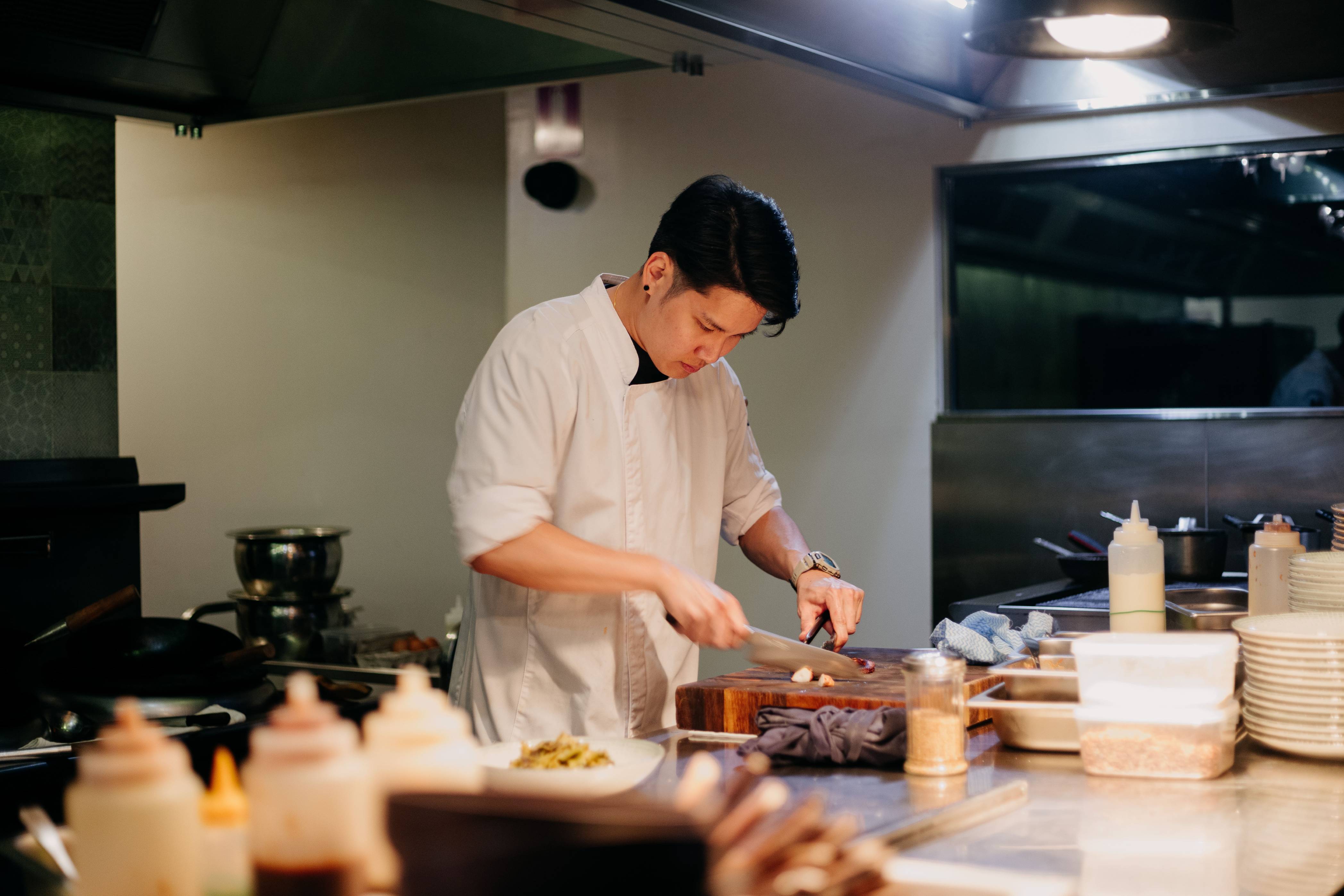 [background image] image of office workspace with desks (for a film production company)