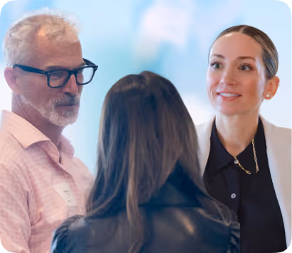 SimerVirens business professionals in friendly discussion with blurred background