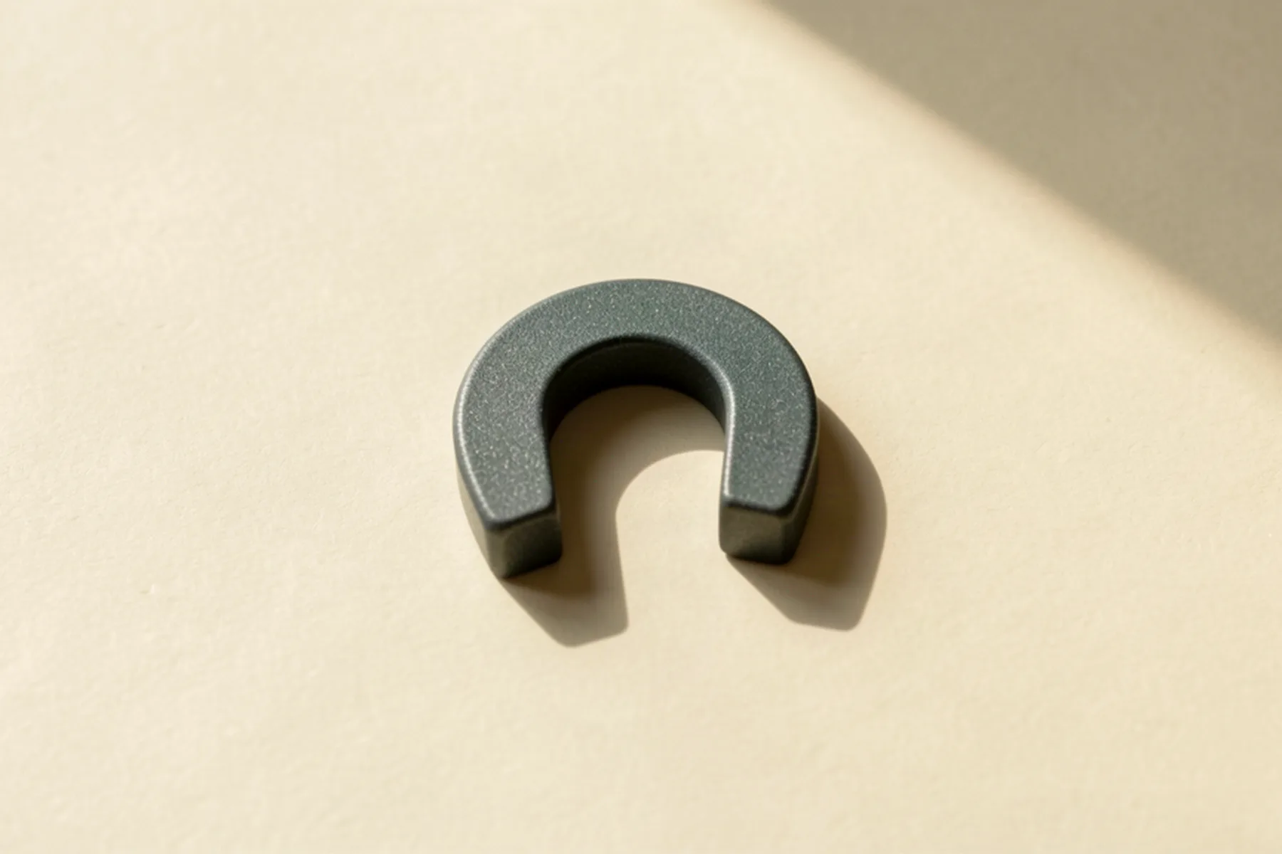 Figure-eight TMS coil positioned beside an empty treatment chair