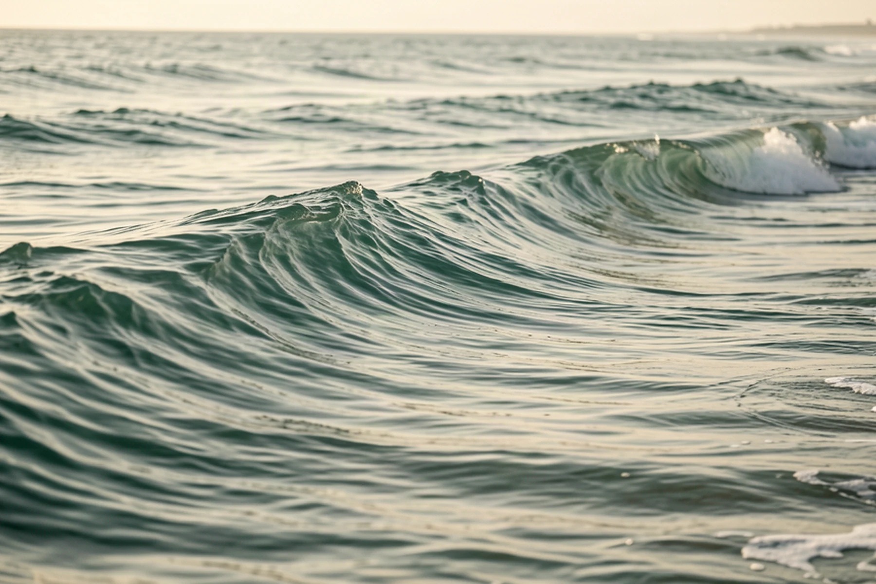 Closely stacked ocean waves representing repeated TMS sessions delivered in a compressed schedule.