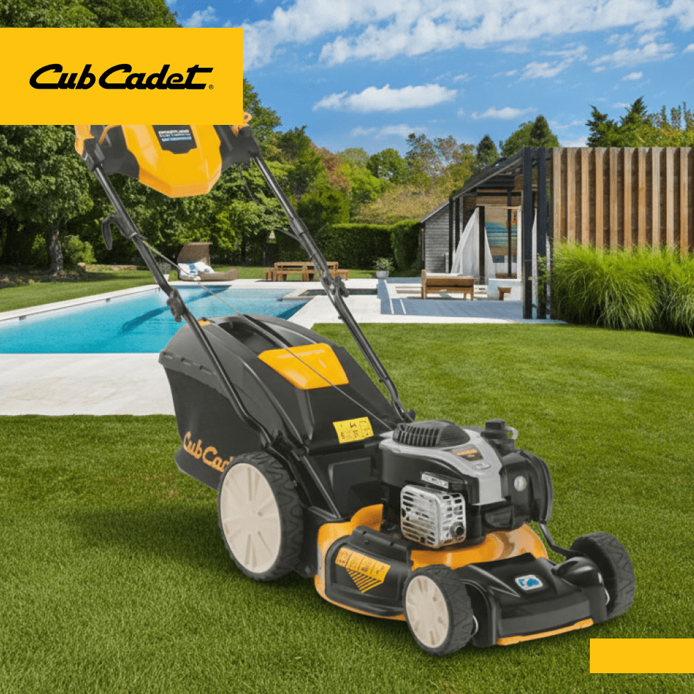 Un cortacésped Cub Cadet modelo LM3CR46S sobre un hermoso prado y una piscinas de fondo.