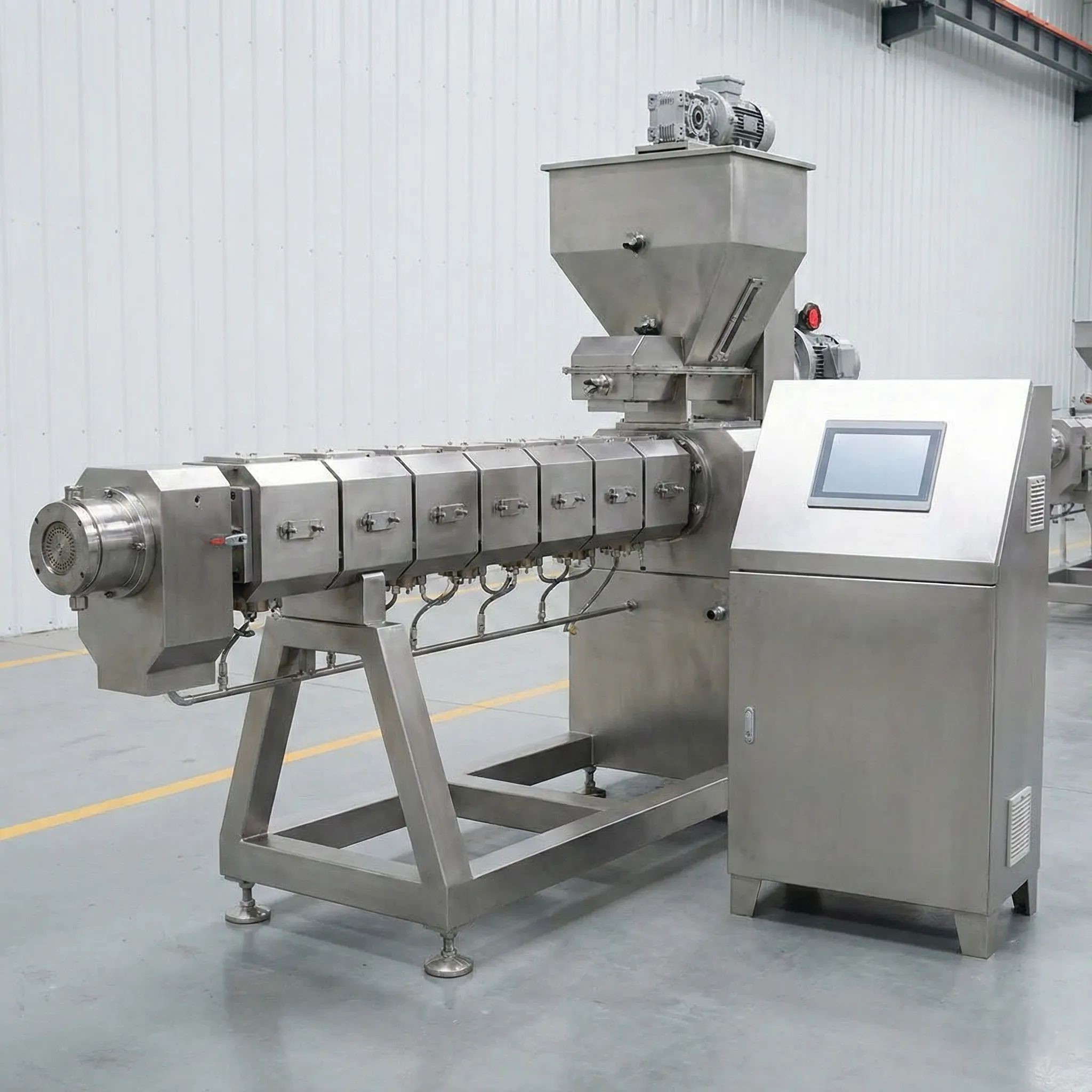 Food extruder forming snacks or cereal with controlled heat and pressure