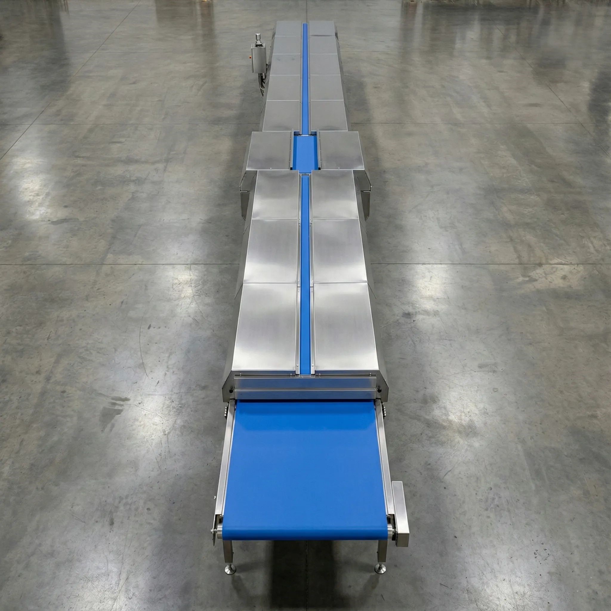 Cooling tunnel chilling confectionery or baked goods before packaging